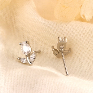 Close-up of S925 sterling silver tulip stud earrings with sparkling zircon crystals