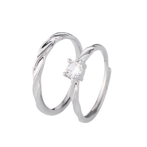 Sparkling galaxy Mobius couple rings set with twisted texture and round cut diamond