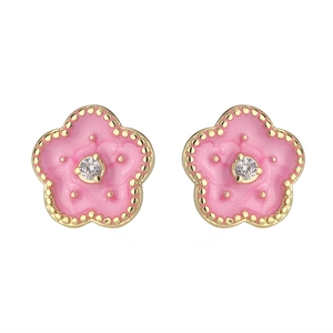 Detailed view of peach blossom enamel studs with pink petals and a central zircon stone