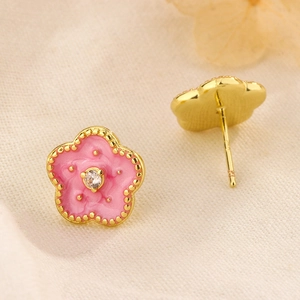 Pink enamel flower stud earrings with gold plating and cubic zirconia center