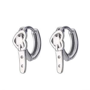 Detail view of silver heart earrings featuring unique vertical strap buckle design