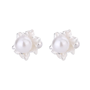 Detailed view of silver flower pearl earrings with secure ball screw back closure