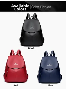 Close-up of litchi texture cowhide backpacks with kangaroo logo and metallic buckle details