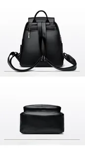 Detailed view of black litchi texture leather backpack with anti-theft back pocket