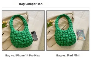 Green puffy shoulder bag size comparison with iPhone 14 Pro Max and iPad mini device