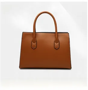 Back view of brown woven texture tote bag featuring clean black edge sealing detail
