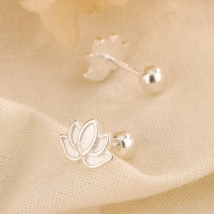 Minimalist silver lotus flower stud earrings with matte texture and screw back closures