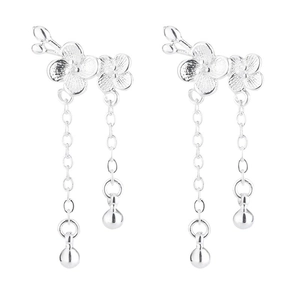 Silver plum blossom tassel earrings with delicate flower pendants on white background