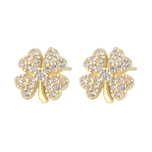 Detailed view of pavé clover earrings with pink and clear cubic zirconia in gold plating