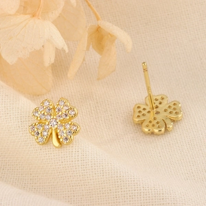 Elegant gold four-leaf clover stud earrings with sparkling pavé crystals for women