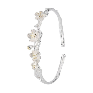 Silver plum blossom open bangle with branch texture and 3D floral relief details