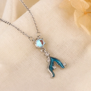 Elegant mermaid tail necklace with moonstone and sparkling crystals on silver chain