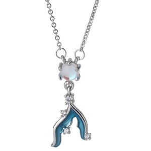 Silver fishtail necklace with moonstone and blue enamel mermaid pendant on white background