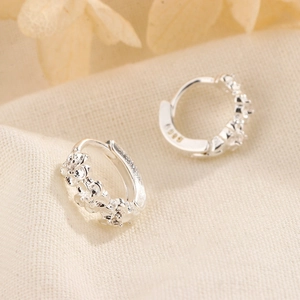 Exquisite S925 sterling silver hoop earrings with 3D floral relief design on fabric