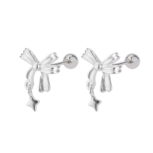 Close-up of silver bow stud earrings with star pendants and secure screw-back design