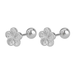 Macro detail of silver floral stud earrings featuring secure screw-back ball closures