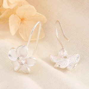 Elegant S925 silver flower earrings with zircon center and matte textured petals