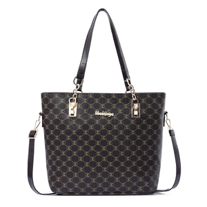Grand sac cabas vintage classique avec motif monogramme M et finitions en métal doré