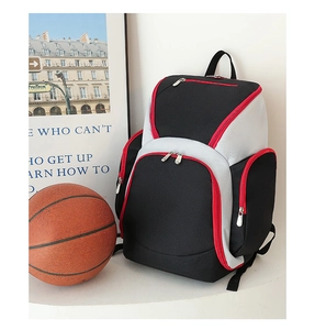 Detailed view of the multi-zipper compartments and water-resistant oxford fabric of the gym bag