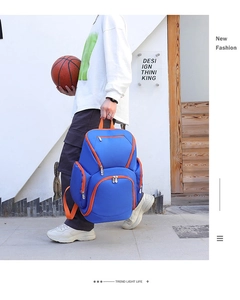 Blue and orange fitness backpack detail showing water-resistant oxford fabric and large pockets