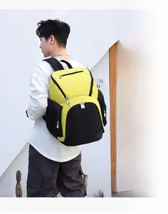 Detail view of water-resistant oxford backpack with yellow and black contrast panels