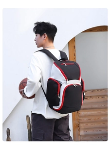 Detailed side view of the large capacity oxford fabric sports backpack with red zipper accents