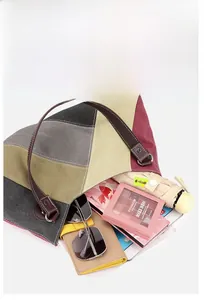 Top view of large canvas tote bag interior showing organized daily essentials storage