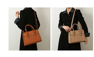 Close-up of stylish handbag set with crocodile pattern and golden metal hardware