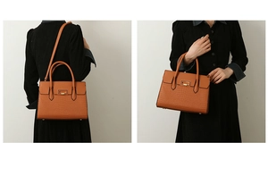 Detail of caramel crocodile embossed tote bag shown in handheld and shoulder carry styles