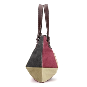 Minimalist patchwork canvas tote bag with contrast colors and leather handles