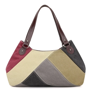 Large capacity canvas tote bag featuring multi-color patchwork design and leather handles