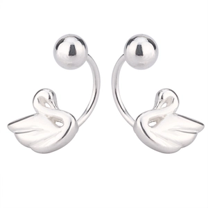 Macro detail of swan-shaped silver earrings featuring curved hooks and ball screw backs