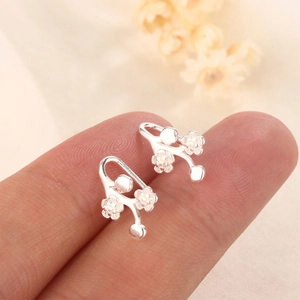 Elegant S925 sterling silver plum blossom branch earrings with matte sandblasted finish