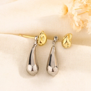 Elegant two-tone gold and silver teardrop earrings with a polished metallic finish