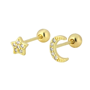 Macro detail of asymmetric star and crescent moon stud earrings with zircon inlay