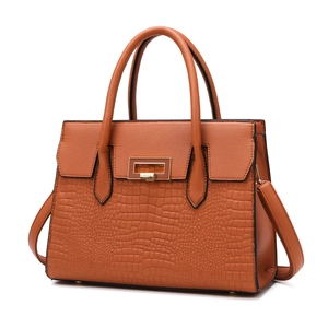 Orange brown tote bag with crocodile embossed pattern and adjustable shoulder strap