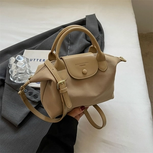 Minimalist khaki oxford fabric handbag with top handles and adjustable shoulder strap