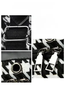 Detail of silver buckles and zipper on black and white houndstooth fabric backpack
