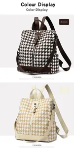 Detail view of houndstock pattern backpacks in brown and beige with leather accents