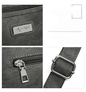 Close-up of cross-pattern leather texture, silver brand metal logo and zipper hardware