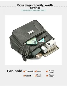 Internal view showing large capacity and multiple pockets of this grey canvas crossbody bag