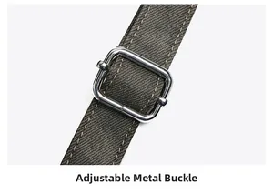Detail of adjustable silver hardware buckle on a vintage soft leather messenger bag strap