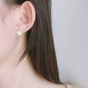 French style gold round stud earrings with halo diamonds and sparkling center zircon