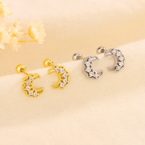 Close-up of crescent moon screw-back earrings with shimmering pavé cubic zirconia