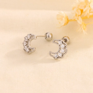 Minimalist silver crescent moon stud earrings with sparkling cubic zirconia stones