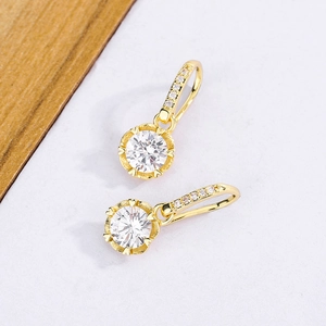Elegant gold flower halo earrings with large round claw-set crystal and diamond accents