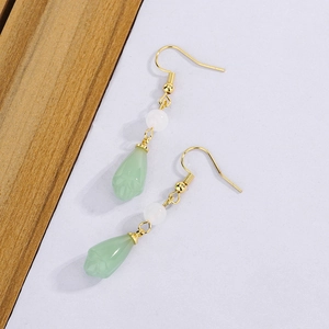Elegant Chinese magnolia earrings with green jade-like pendants and white pearls
