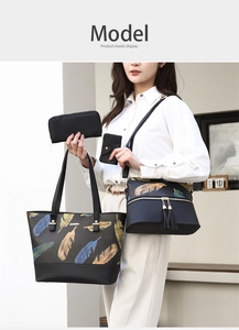 Detailed four-piece black tote bag set featuring colorful feather prints and a tassel bag