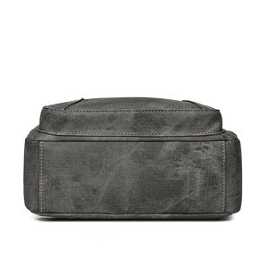 Bottom view of vintage grey soft canvas handbag showing durable rectangular stitching detail