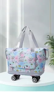 Macro shot of 4-wheel base and unicorn pattern on quilted expandable travel bag